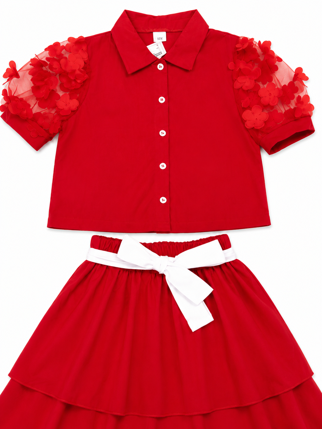 Set niña con blusa de manga florales y falda de Olanes