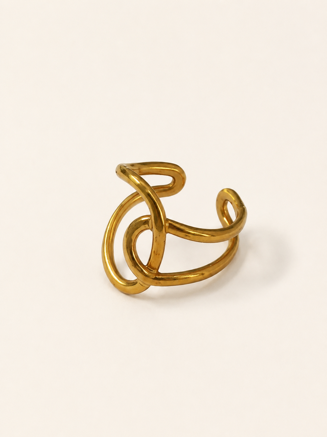 Anillo dama dorado diseño entrelazado ✨