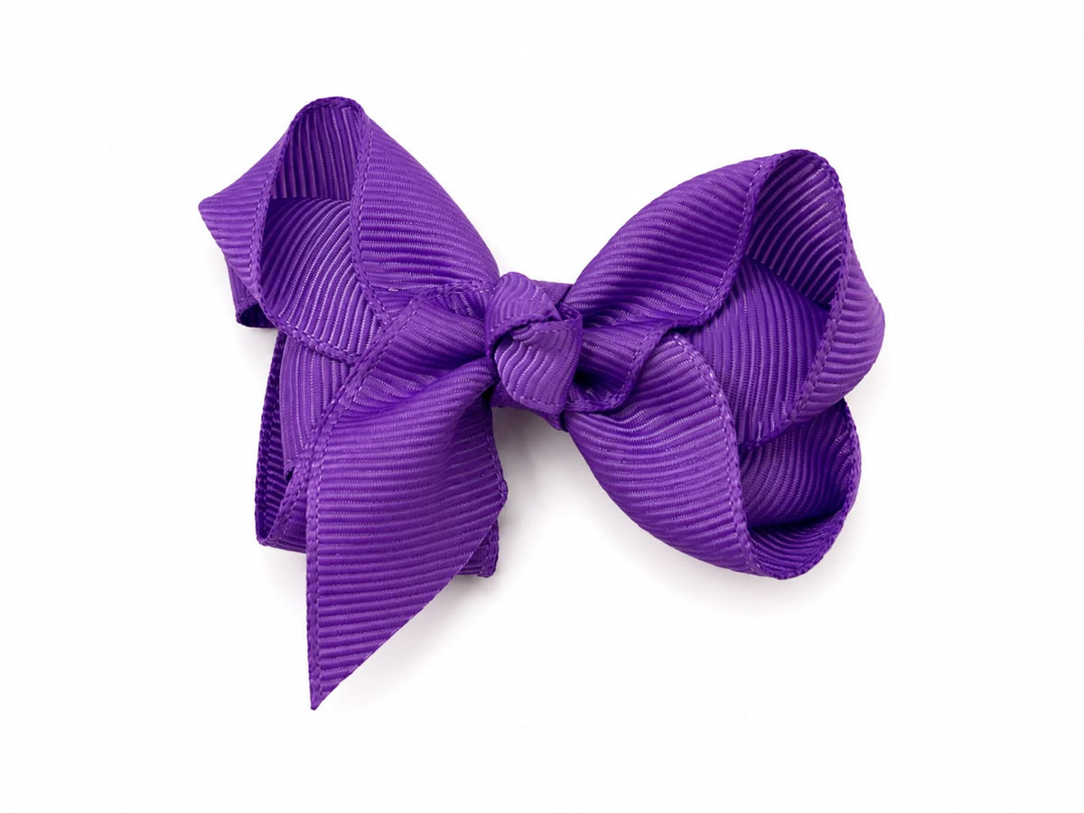 Moño chico niña morado clásico