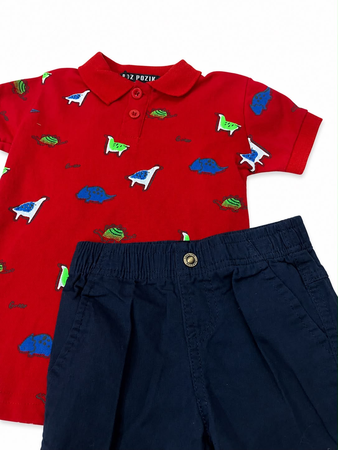 Set niña tipo polo dinosaurio con short azul marino
