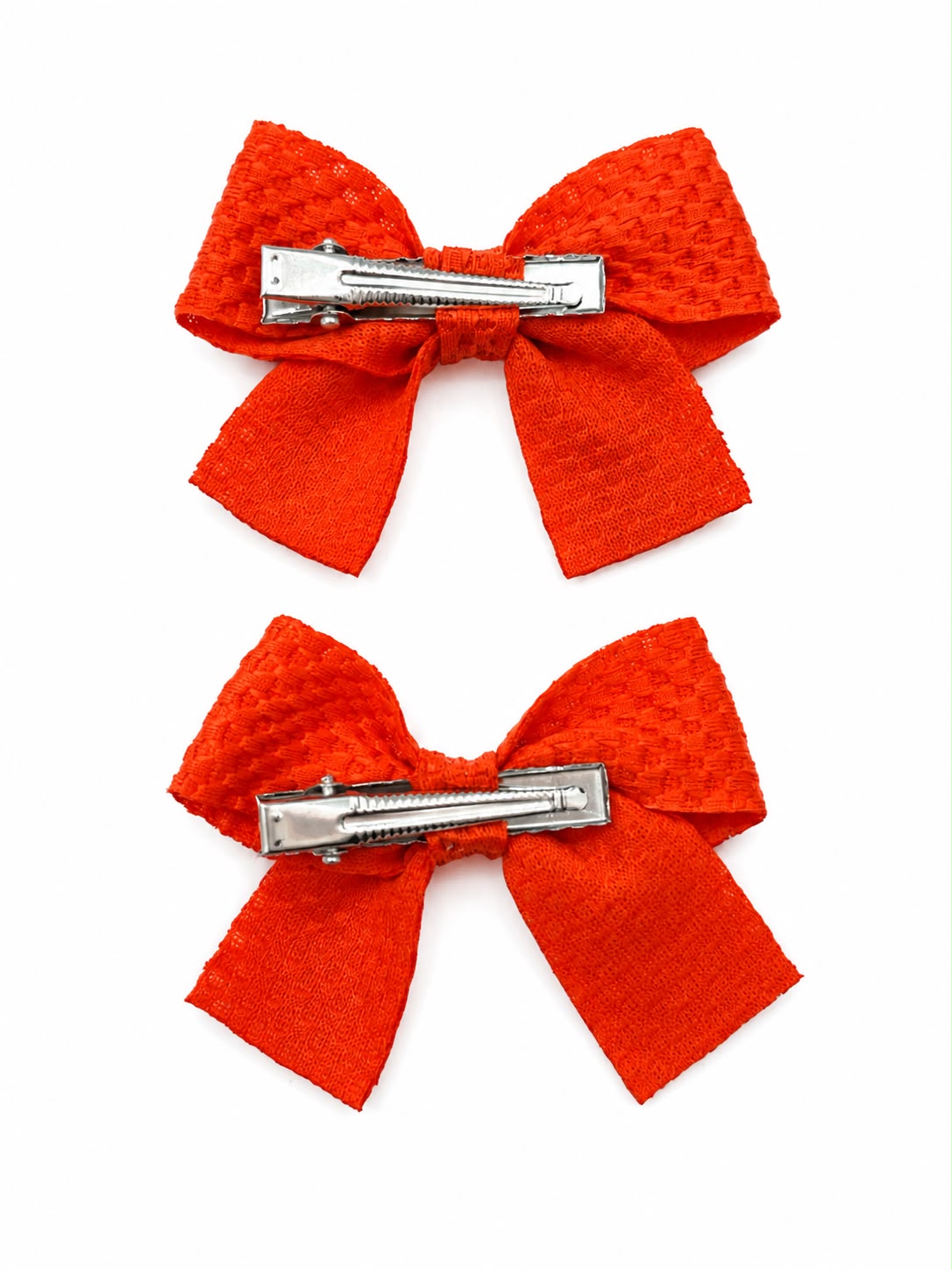 Moño par niña naranja texturizado