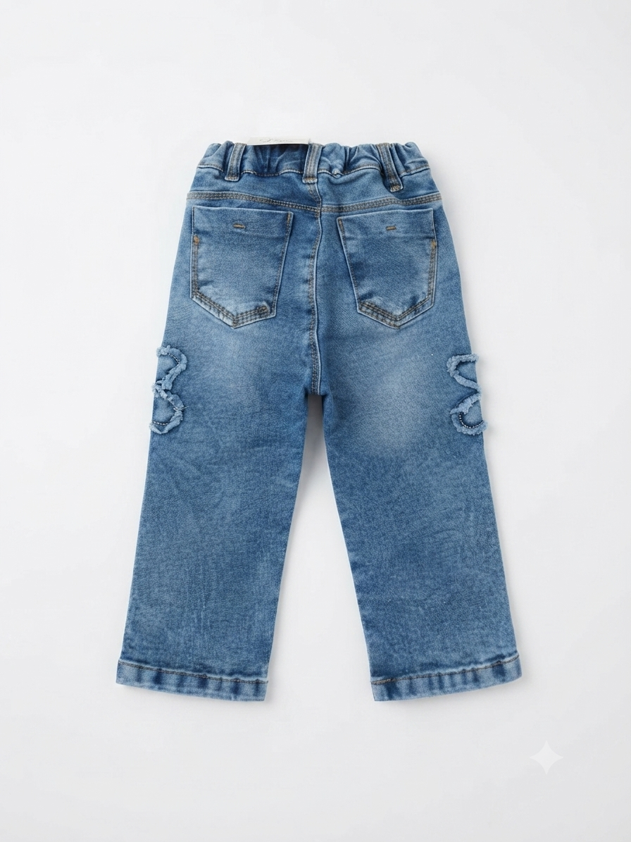 Pantalón niña de mezclilla con flores en relieve