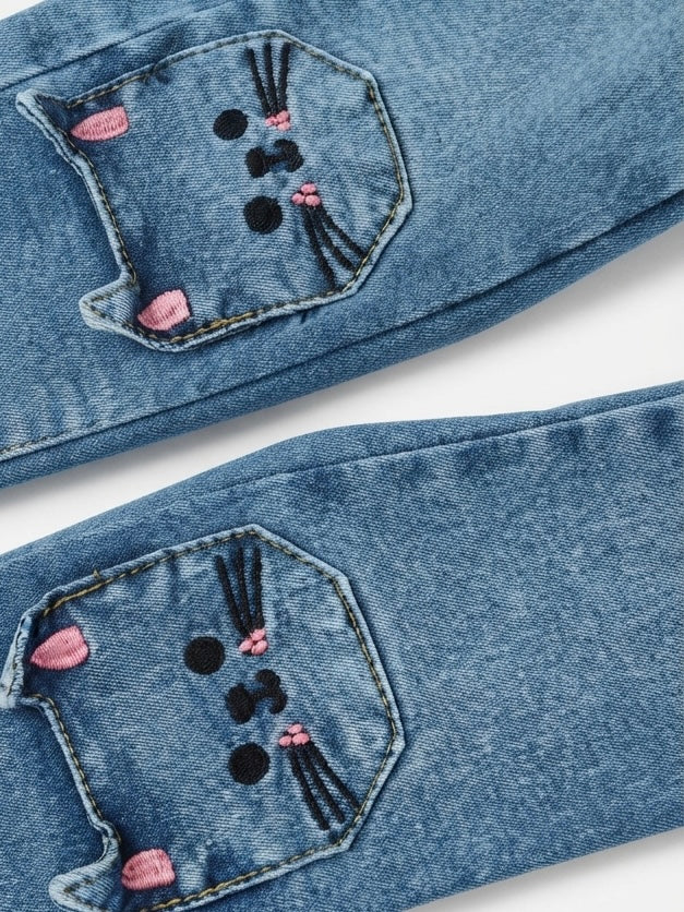 Pantalón niña de mezclilla con bolsillos de gatito