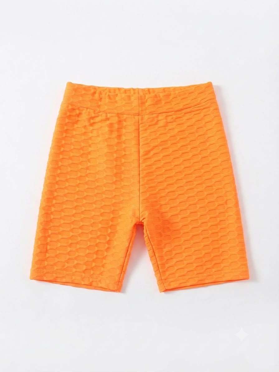 Set niña playera con estampado y short naranja
