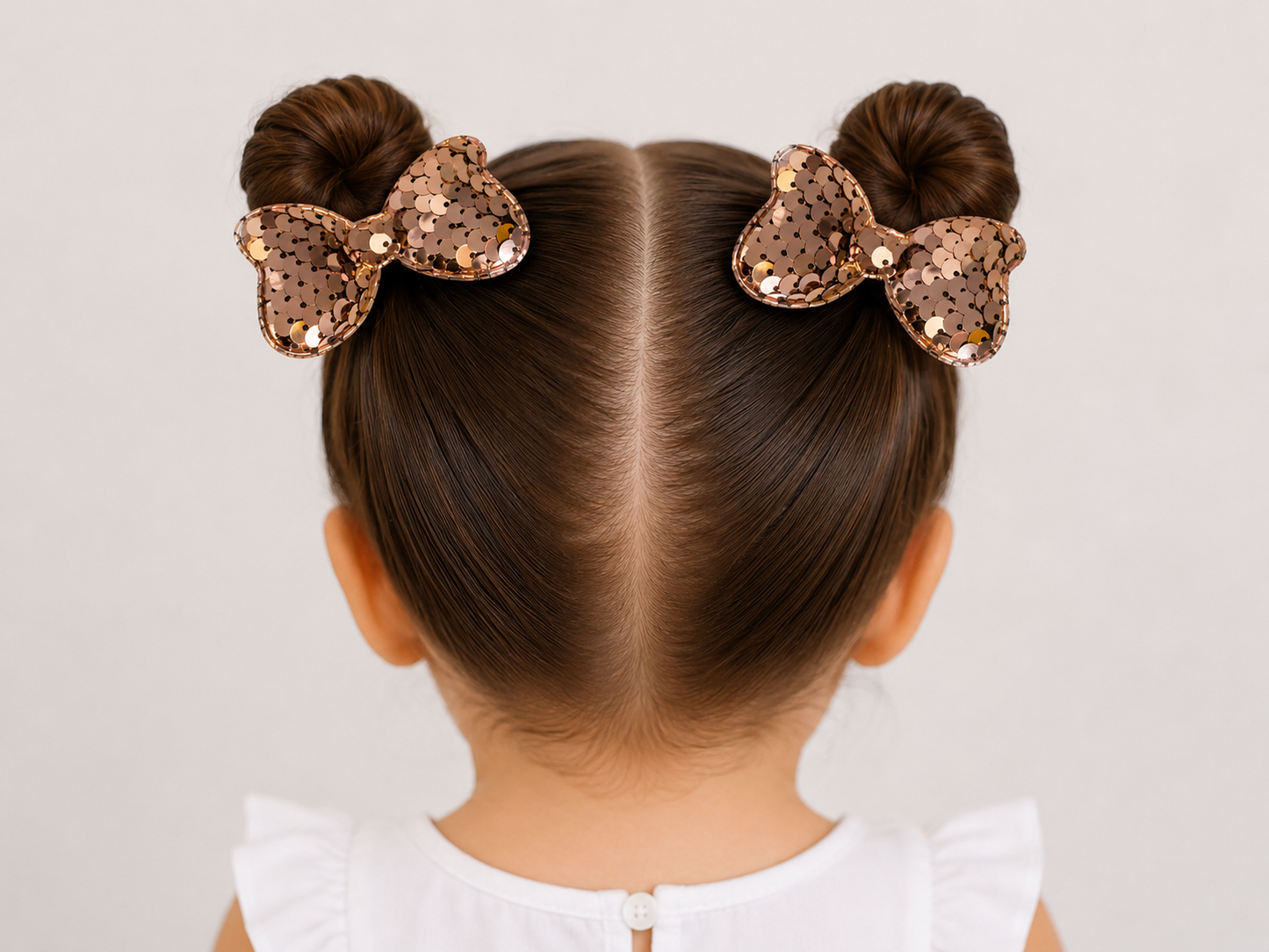 Moño par niña de lentejuelas rose gold