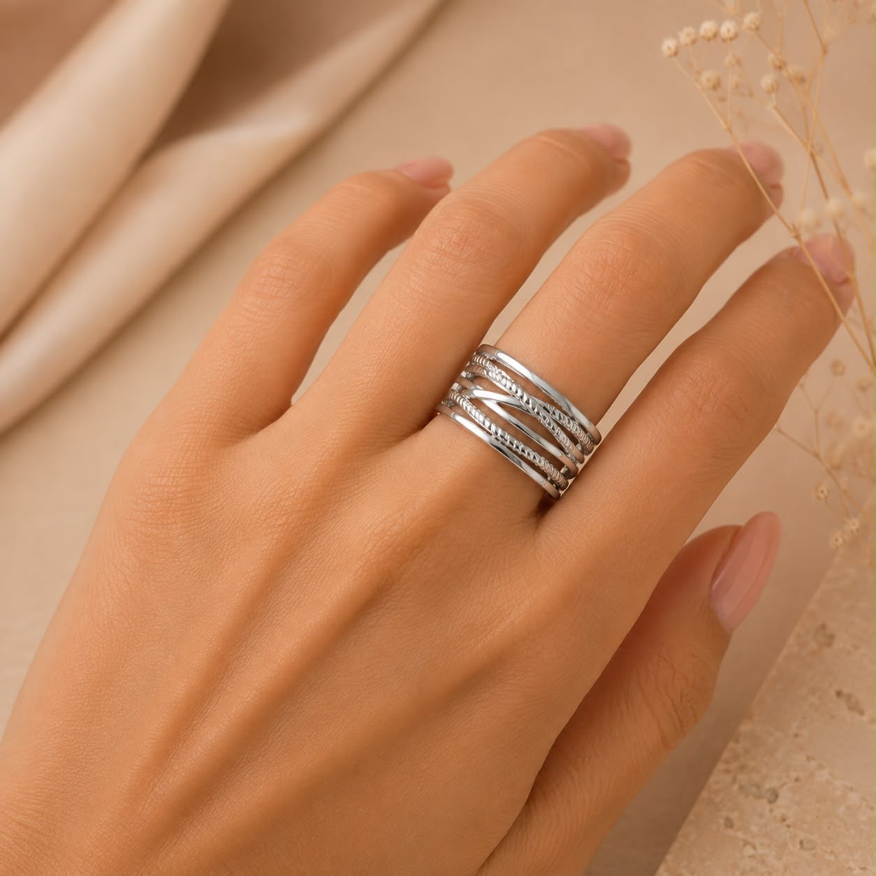 Anillos Dama plateados diseño entrelazado