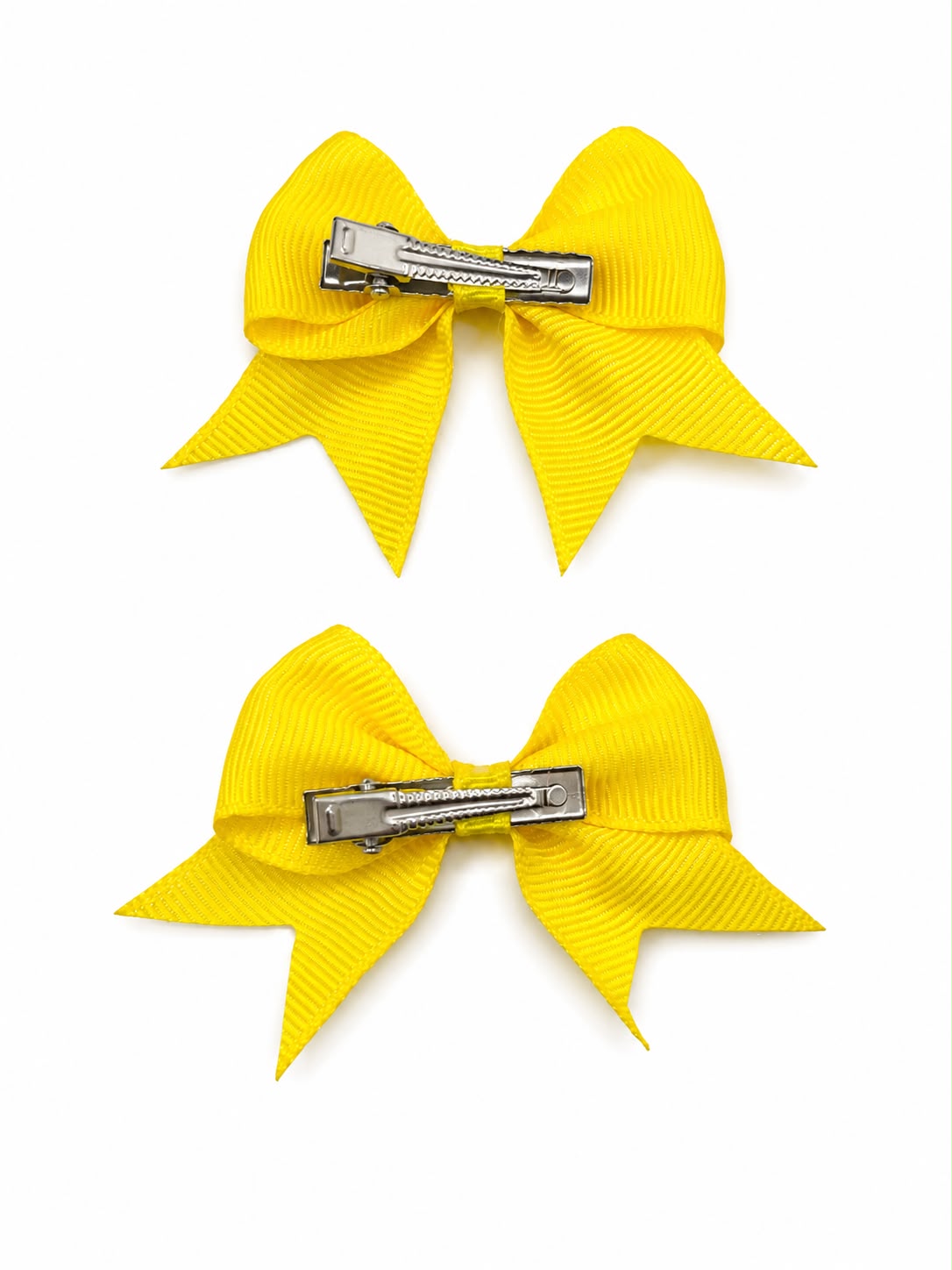 Moño par niña amarillo con puntas