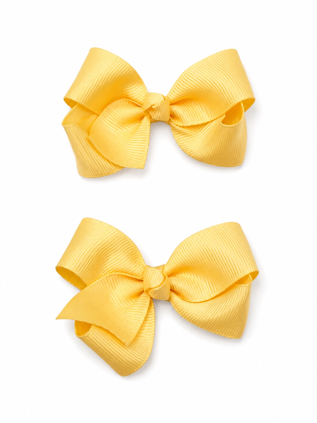 Moño par niña color amarillo