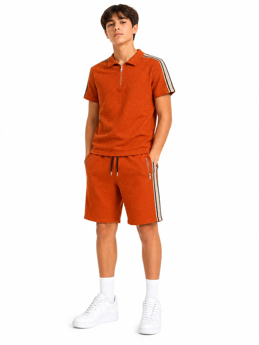 Set niño deportivo polo terracota con cierre y short a juego