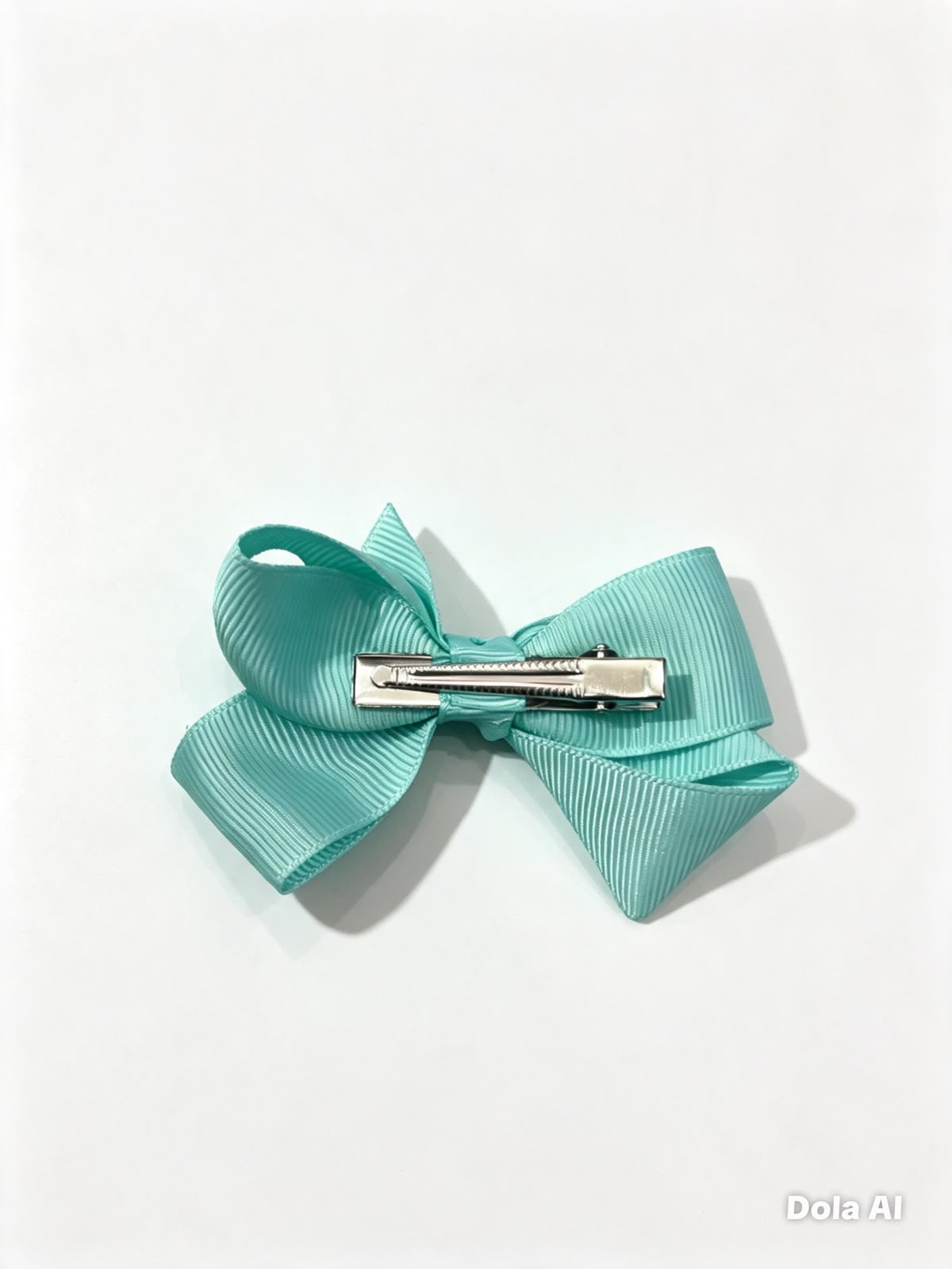 Moño chico niña azul menta