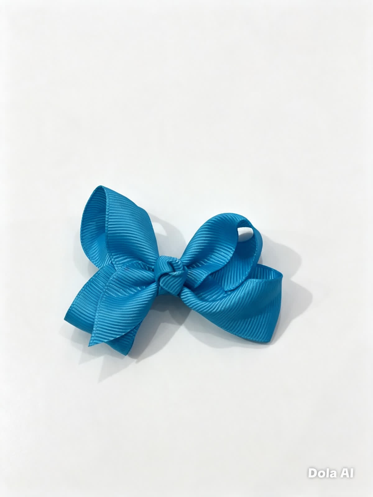 Moño chico niña azul turquesa