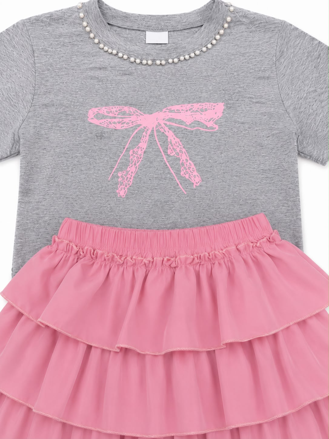 Set niña blusa gris con falda de olanes rosa