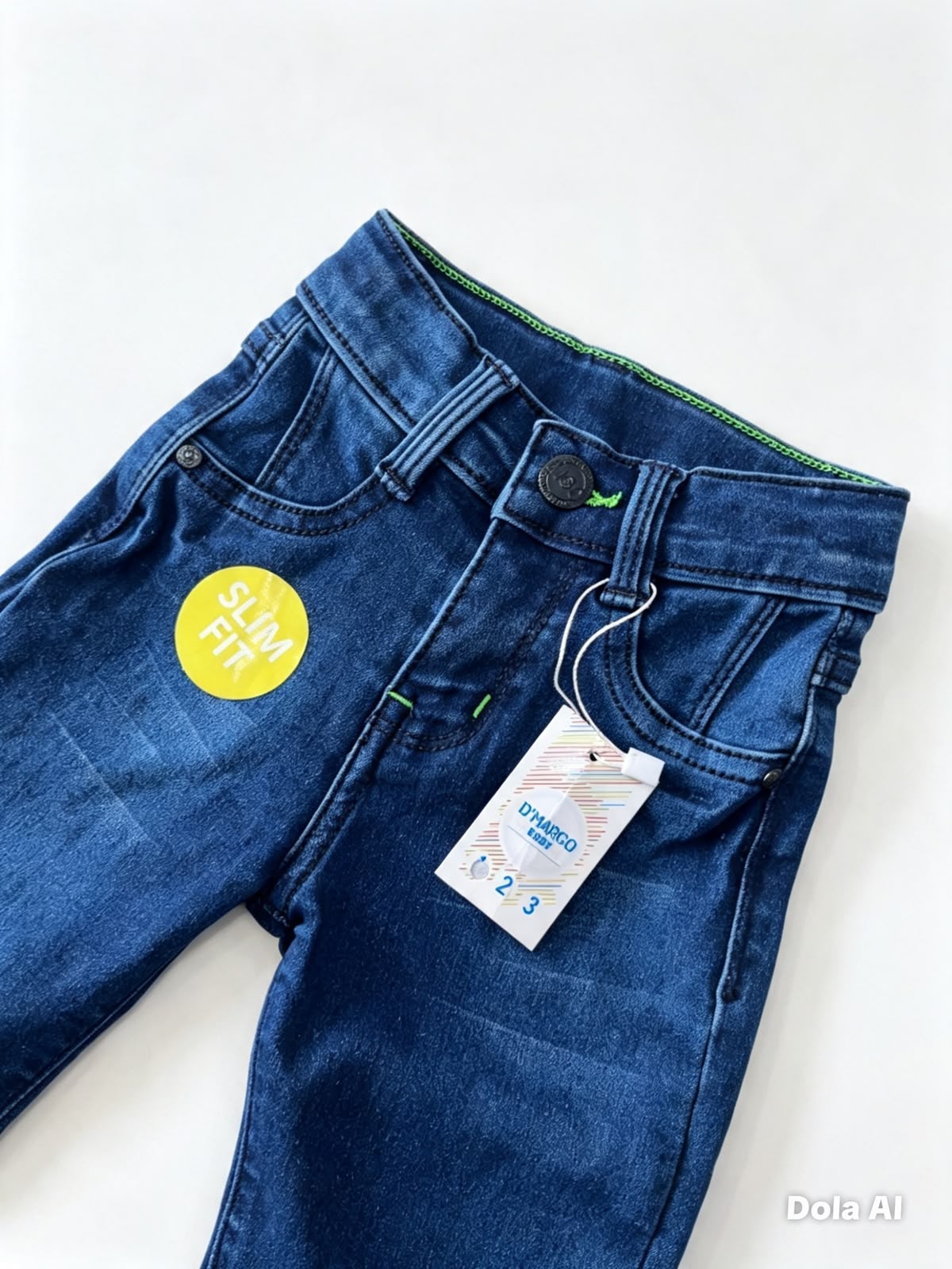 Pantalón niño mezclilla azul con costuras verdes