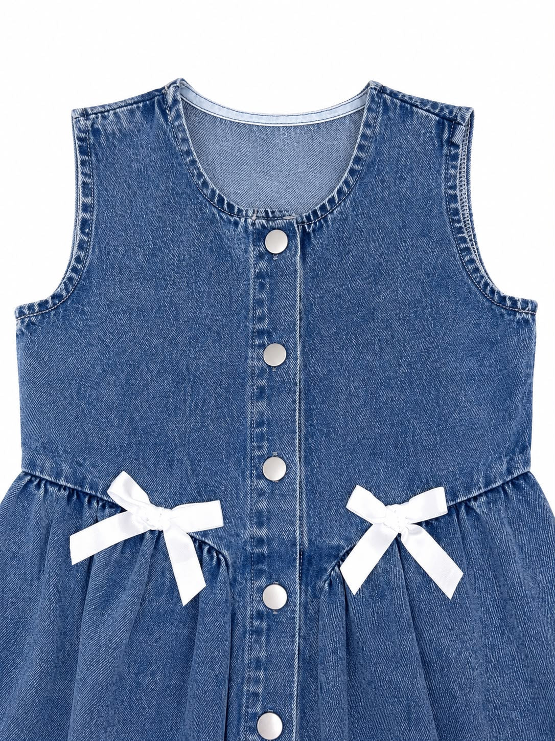Vestido niña de mezclilla con botones y moños decorativos