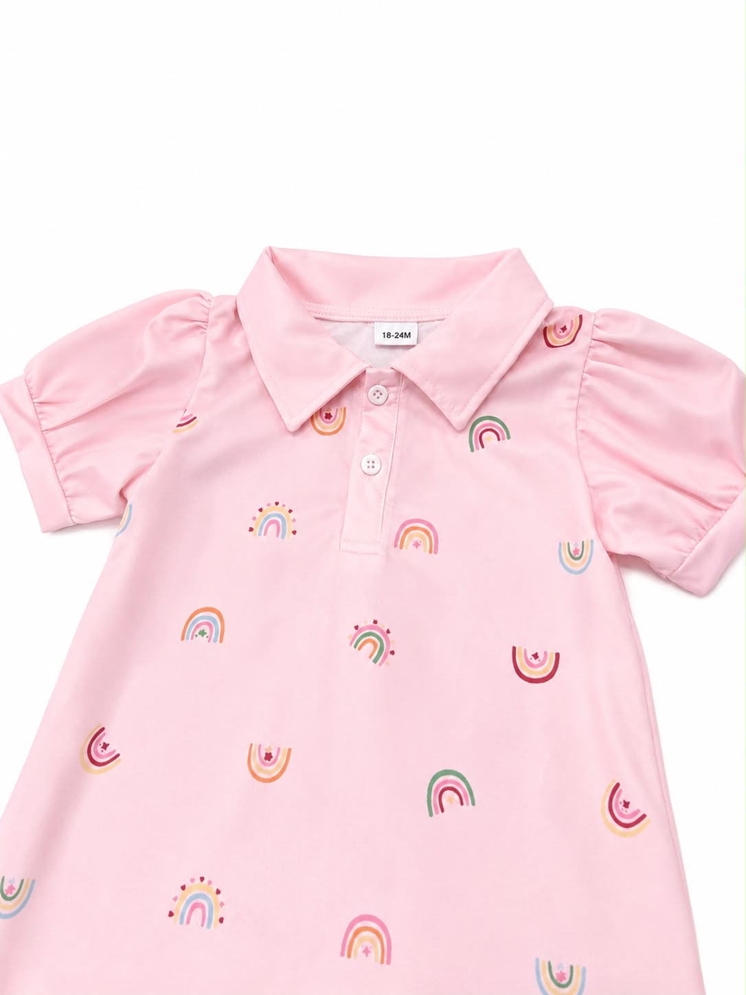 Vestido niña meses tipo polo con estampado de arcoíris – Rosa pastel