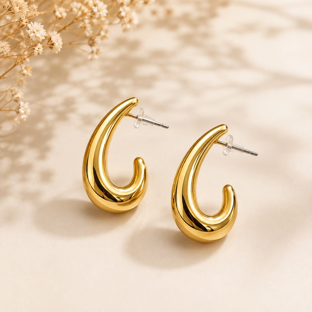 Aretes Gota curva Dorados elegantes