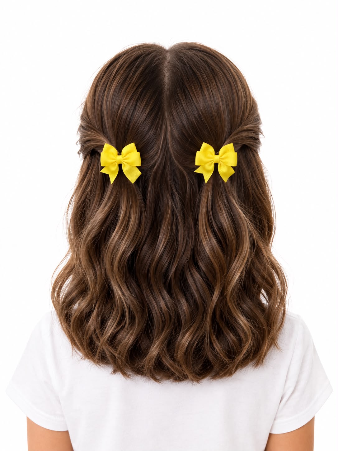 Moño par niña amarillo