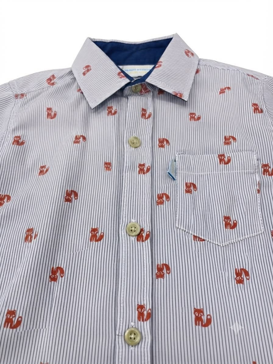 Camisa niño de manga larga con estampado y bolsillo