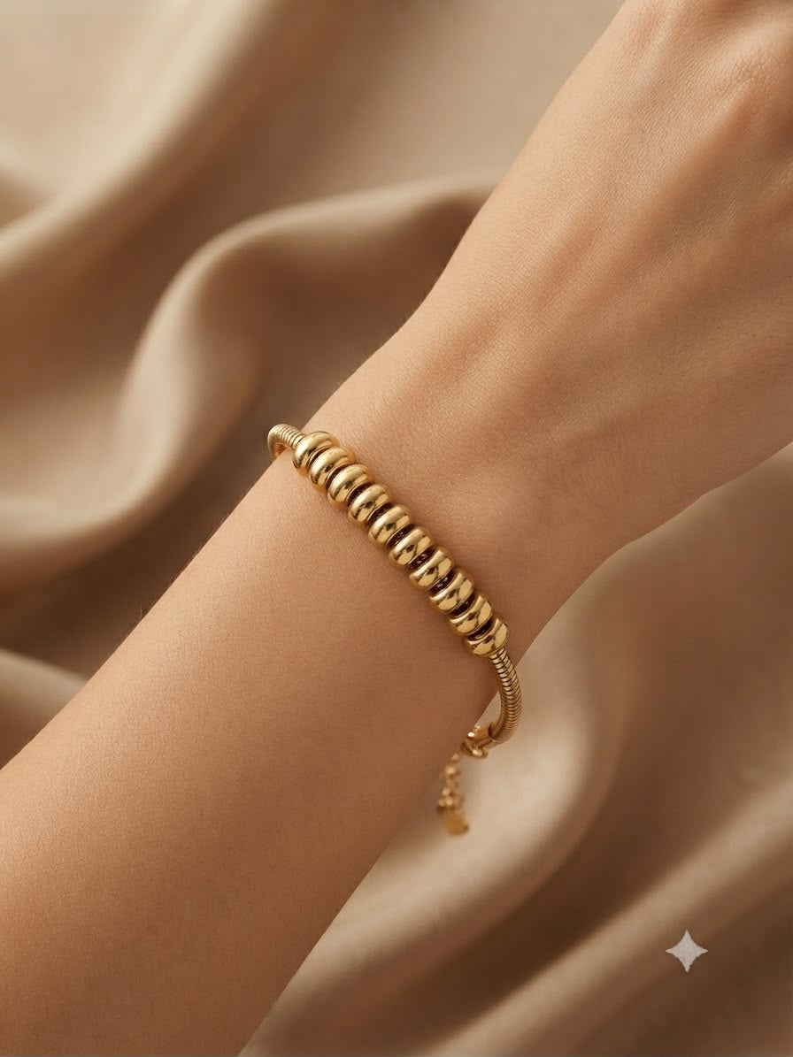 Pulsera Dama dorada diseño espiral