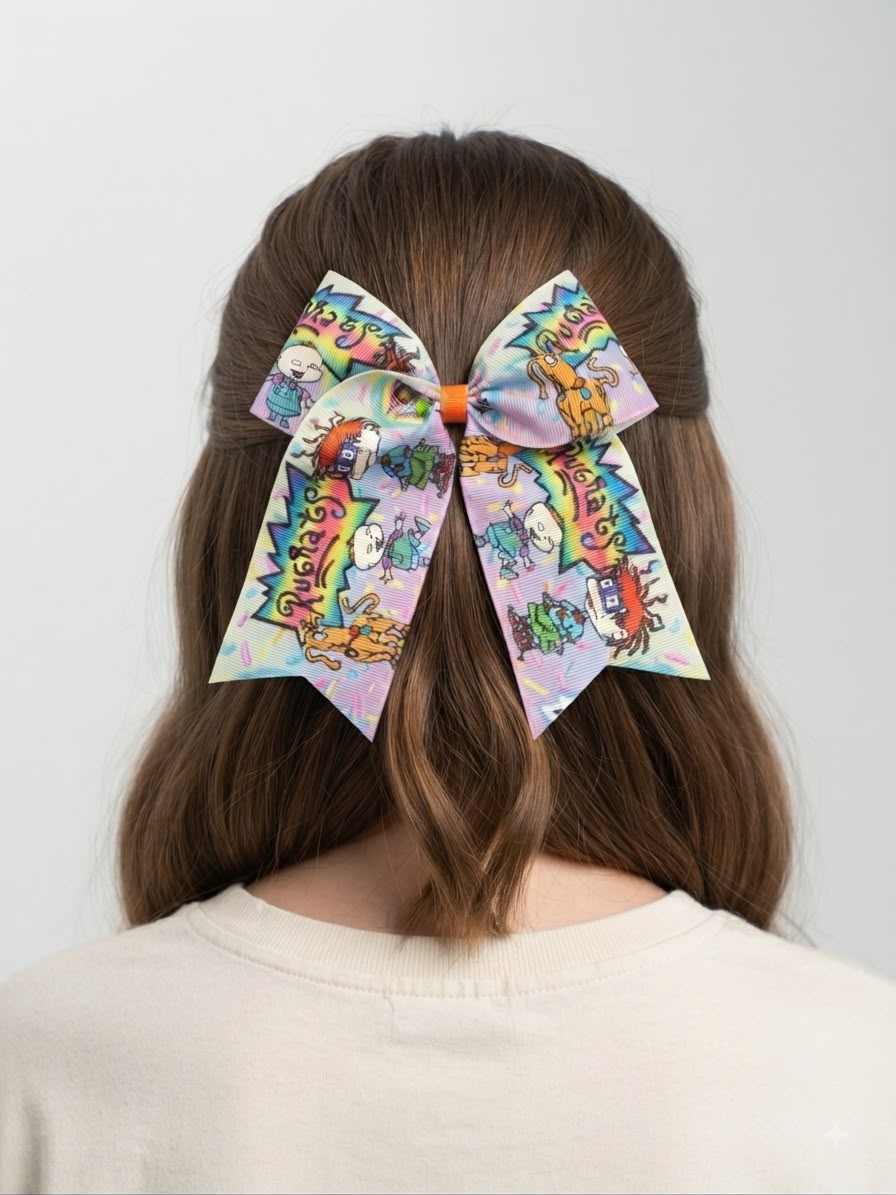 Moño niña estampado caricatura multicolor con tiras largas