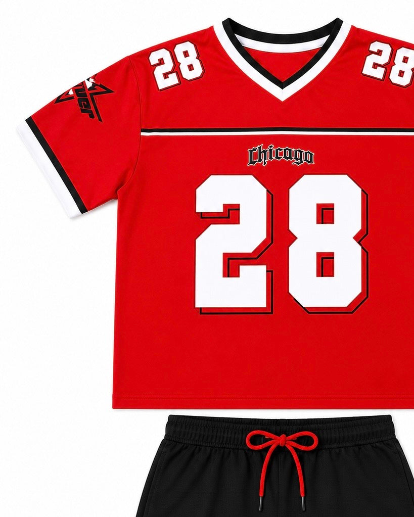 Set niño deportivo rojo y short negro de dos piezas