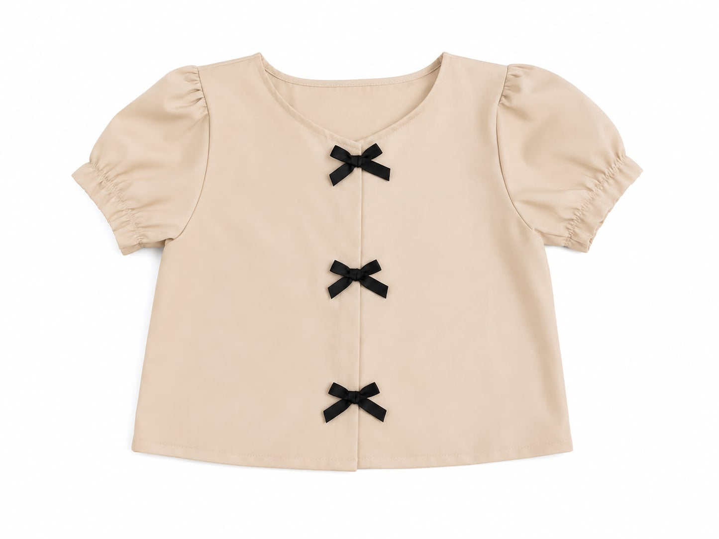 Set niña beige con moños decorativos