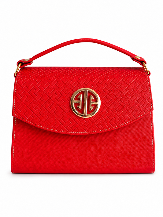 Bolsa dama roja elegante con textura grabada y herrajes dorados