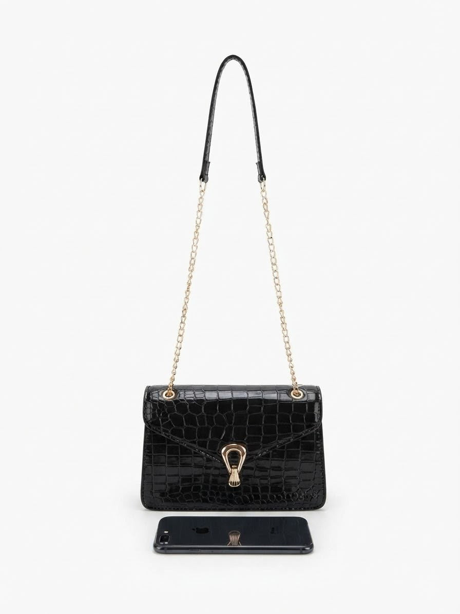 Bolsa dama con textura tipo cocodrilo y cadena ✨