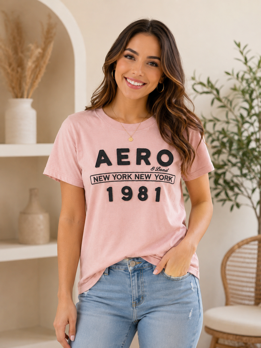 Blusa dama rosa con aplicación en relieve