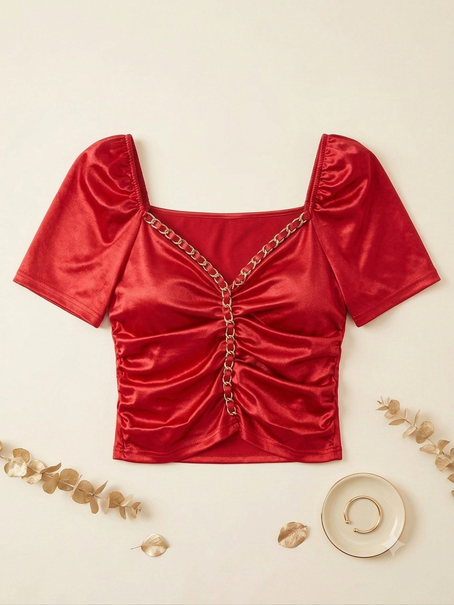 Blusa dama satinada con detalle de cadena