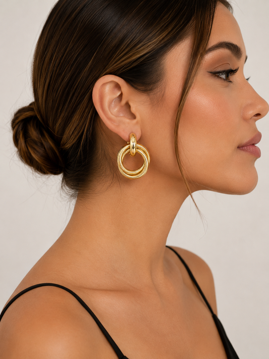 ✨ Aretes Dorados Entrelazados ✨