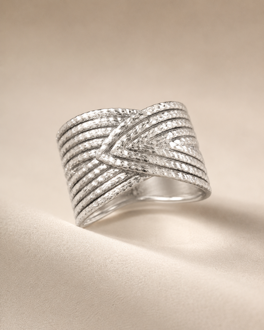 Anillo dama plateado diseño entrelazado