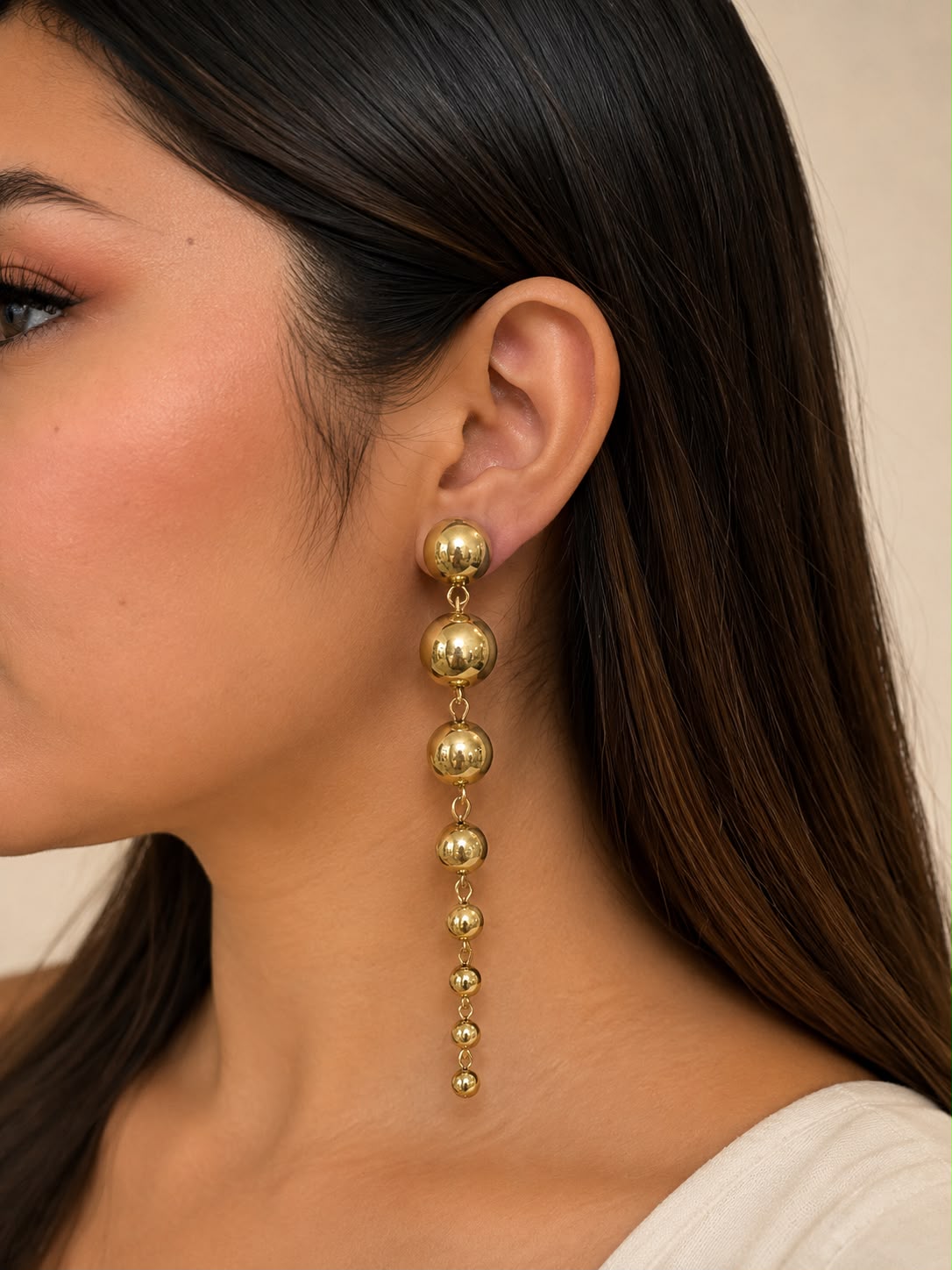 Aretes Colgantes Esferas Doradas