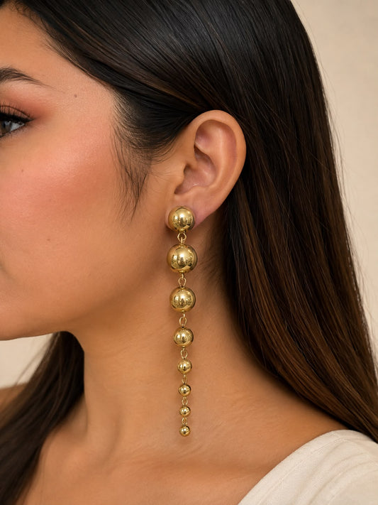 Aretes Colgantes Esferas Doradas
