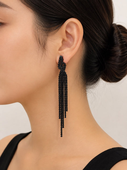 Aretes Lazo con Flecos de Cristales Negros – Elegancia Nocturna