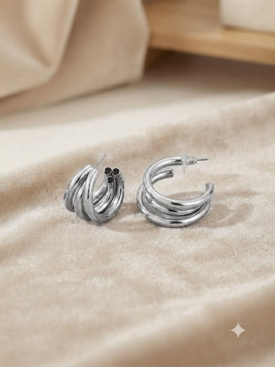 Aretes tipo huggie triples plateados