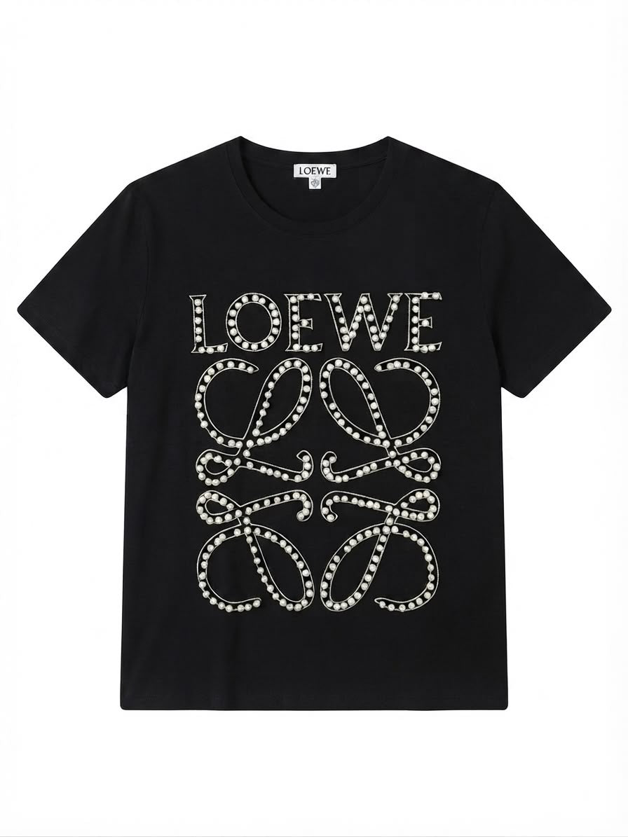 Blusa dama negra con diseño de moños y detalles brillantes