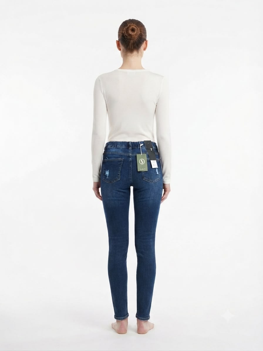 Pantalón dama mezclilla skinny con cintura ajustable y acabado desgastado