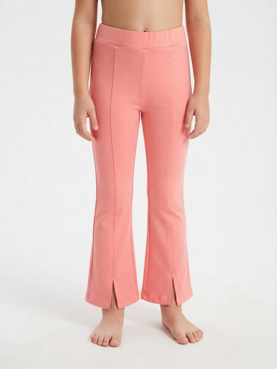 Pantalón niña rosa corte acampanado con abertura frontal 🎀