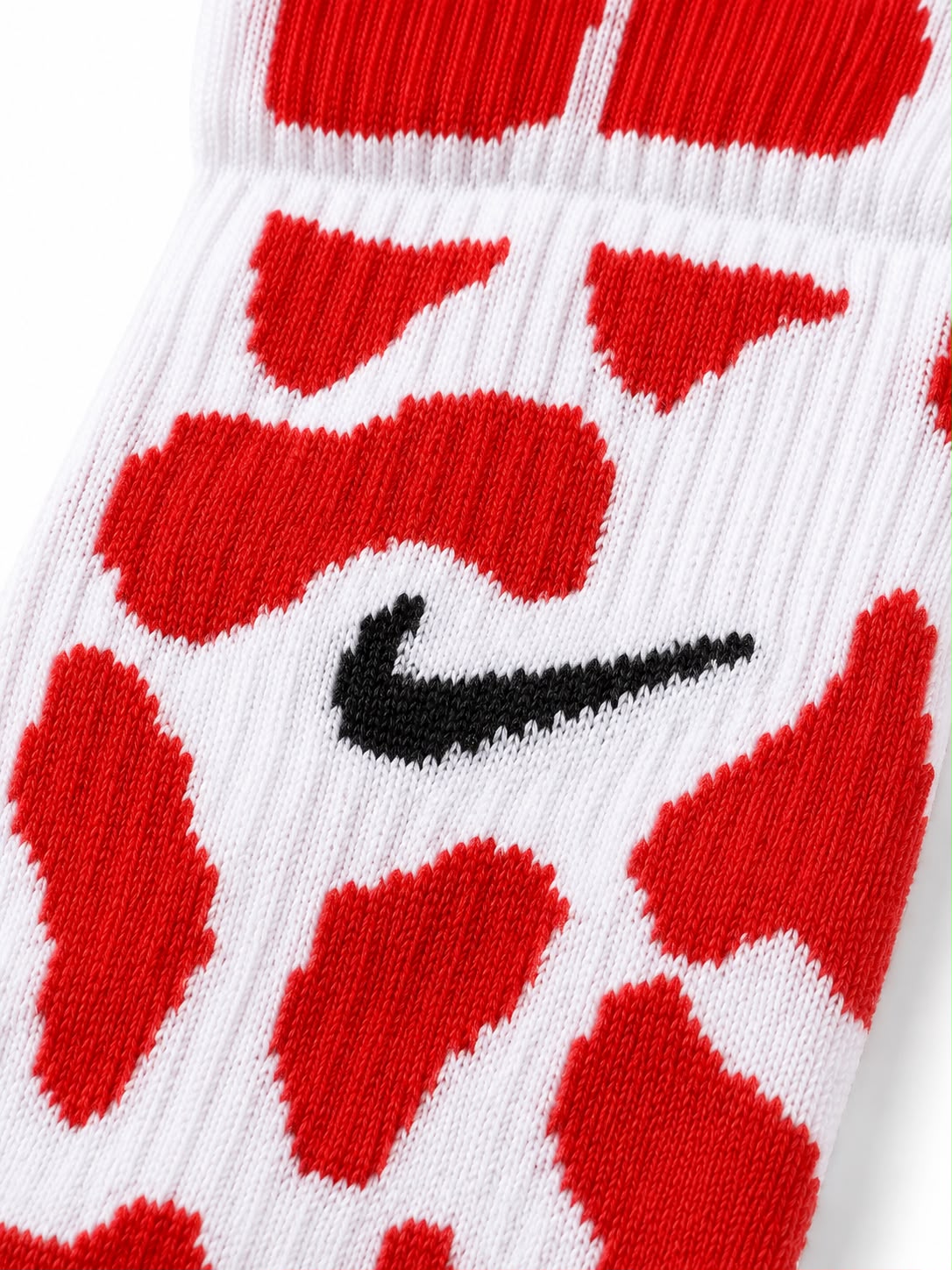 Calceta larga blanca con diseño rojo deportivo