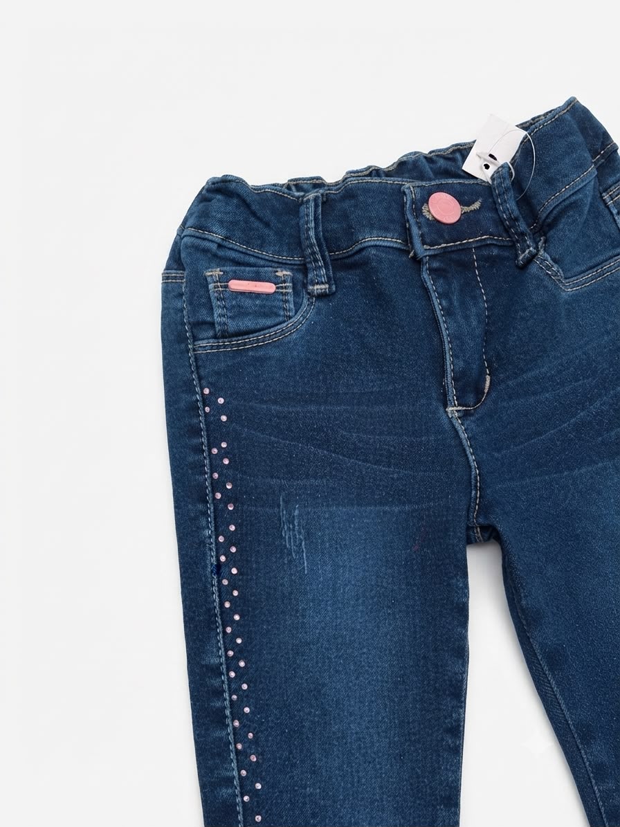 Pantalón niña skinny mezclilla con aplicaciones brillantes