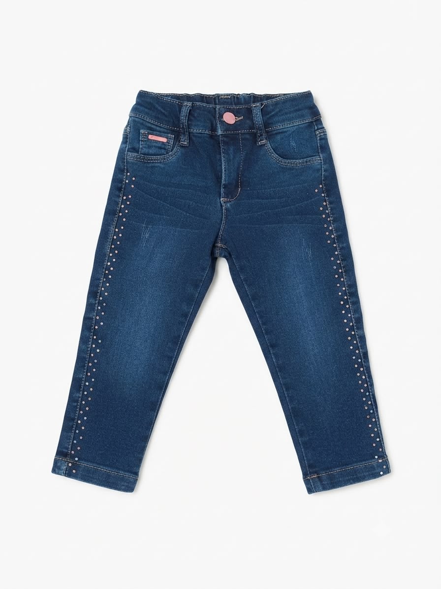 Pantalón niña skinny mezclilla con aplicaciones brillantes