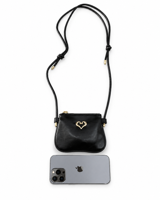Bolsa infantil negra con corazón dorado 🖤✨