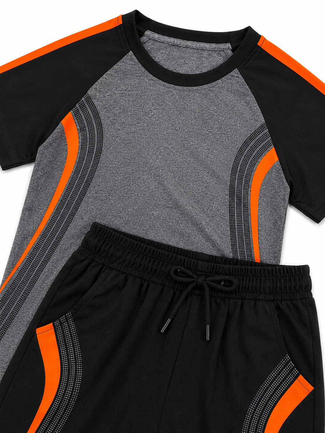 Set deportivo niño gris con negro y detalles naranja